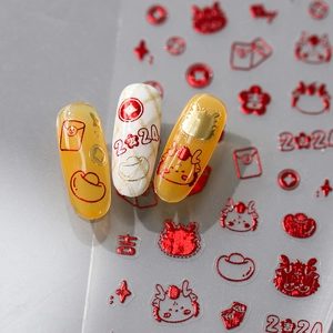 3D embossed Dragon Year nail stickers with gold foil and festive red Chinese patterns