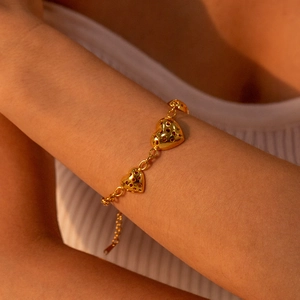 Elegant gold hollow heart pendant bracelet with adjustable link chain for women