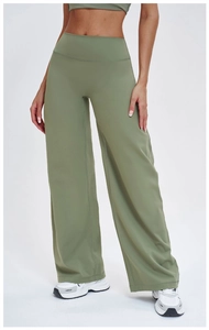 Detail view of sage green high-waisted wide-leg yoga pants with premium elastic fabric