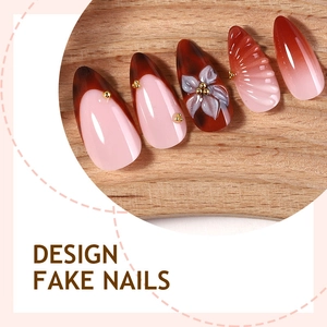 3D floral and leopard print press-on nails in almond shape on a rustic wood surface