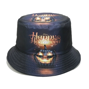 Detailed close-up of a Halloween bucket hat featuring a glowing pumpkin and festive text