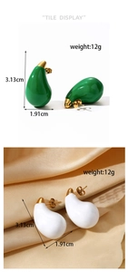 Detail view of water drop earrings in green and white enamel with 18K gold plating