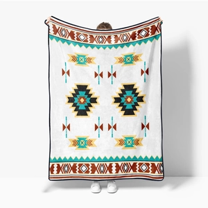 Soft flannel southwestern patterned blanket with turquoise and red geometric tribal motifs