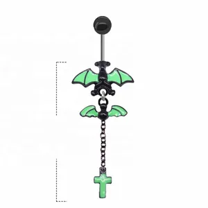 Detail of gothic bat belly ring with green enamel, cross pendant, and 50mm length spec