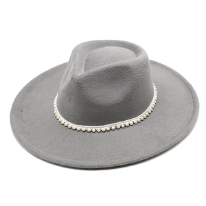 Detail of grey wool felt fedora with elegant pearl bead trim and flat brim style