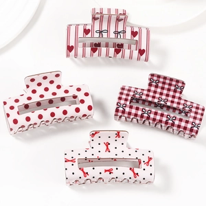 Set of four academic style plaid and polka dot heart hair claws in red and white