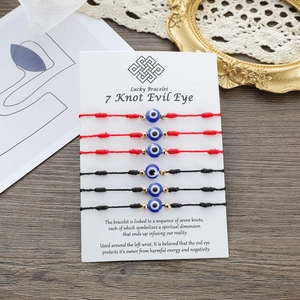 Set di 6 bracciali fatti a mano con 7 nodi e malocchio su carta decorativa da esposizione