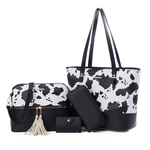 4-piece women handbag set with cow print tote, crossbody bag, wallet and card holder