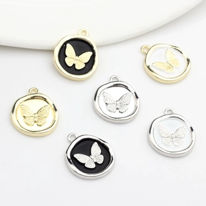 Set of 6 round butterfly alloy charms with enamel finish and sparkling zircon stones
