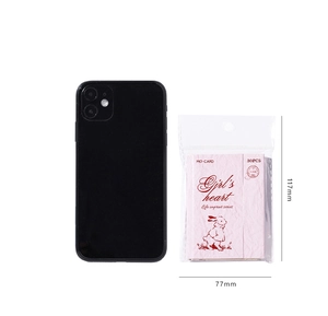 Size comparison of pink retro girl stationery stickers next to a mobile phone