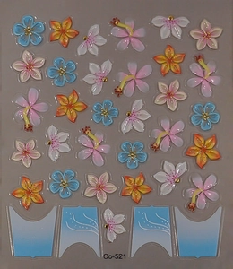 Macro shot of 3D tropical floral nail stickers with hibiscus patterns and gold bead details