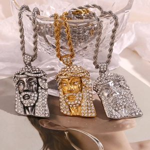 Detailed view of 18K gold plated iced-out Jesus head pendants with rope chains in three colors
