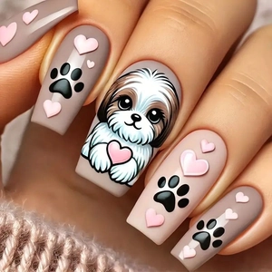 Cute taupe and pink press-on nails with cartoon dog patterns and 3D heart charms