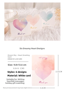 Close-up of Thank You cards with star-themed heart designs and elegant calligraphy