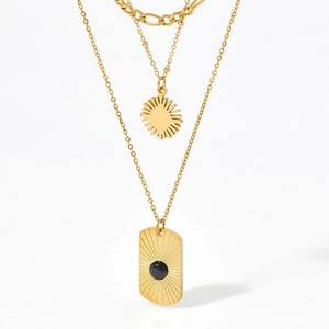 Three-layer gold stainless steel necklace with sunburst and black onyx rectangular pendants