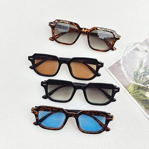 Retro square sunglasses collection in black and tortoise frames with various gradient lenses