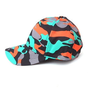 Camo baseball cap featuring a vibrant multi-color orange and blue camouflage pattern