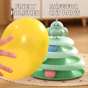 Three-tier mint green cat track toy with colorful balls and a cloud teaser spring