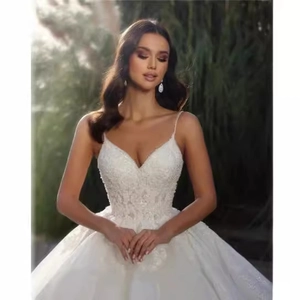 Elegant white ballgown wedding dress with V-neck lace bodice and multilayered tulle skirt