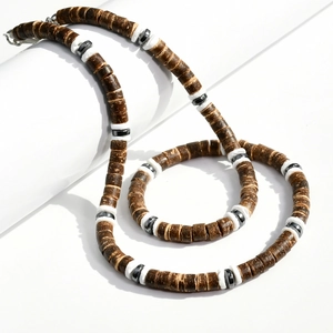 Mens coconut shell beaded necklace with tiger eye stone accents on white background