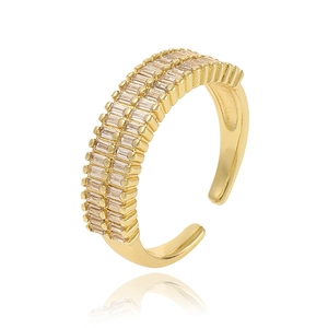 Detail of gold open ring featuring double rows of rectangular clear gemstones on white background