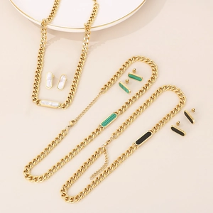 Detailed set of 18K gold plated Cuban chain necklaces and earrings with shell insets