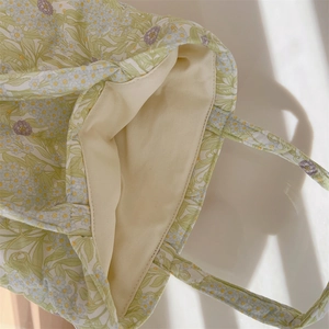 Detailed top view of floral quilted cotton tote bag with soft inner lining and dual handles