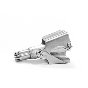 Macro shot of silver stainless steel manual nose hair trimmer with mechanical push design