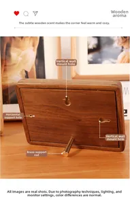 Detail of walnut wood photo frame back with brass support rod and dual mounting holes