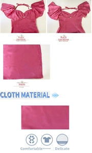 Dettaglio dell'abito in raso fucsia con scollo a cuore e maniche con volant