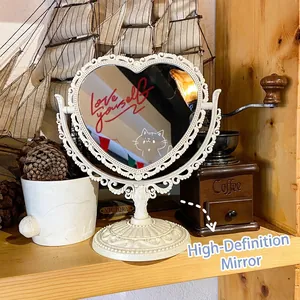 Vintage heart-shaped desktop makeup mirror with European relief and rotating high-definition glass