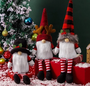 Three festive Christmas gnome plush dolls with plaid hats and long white beards decor