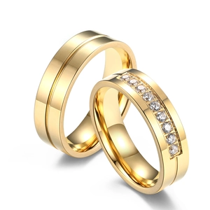 Polished gold plated titanium steel couple rings with cubic zirconia inlay for engagement