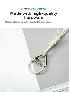 Detail of durable silver plated metal spring clasp with premium braided rope keychain