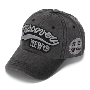 Macro detail of 3D embroidery and washed charcoal cotton fabric on baseball cap