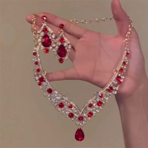 Elegant vintage gold necklace and earring set with red teardrop zircons and crystals