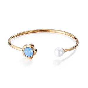 Minimalist open gold bracelet with blue flower crystal and white pearl for women