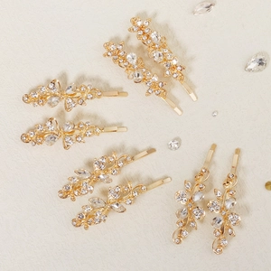 Set of 8 vintage gold floral and butterfly hair clips with sparkling crystals