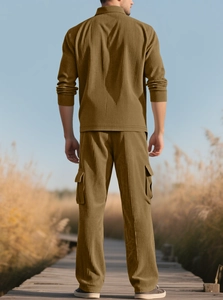 Rear view of men's brown corduroy tracksuit set featuring cargo pants and long sleeve jacket