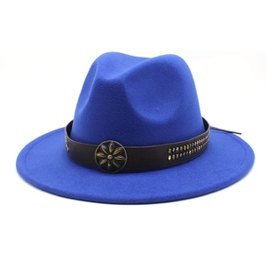 Detail of royal blue felt hat featuring a brown leather band and bronze floral metal buckle