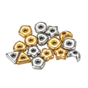 Macro view of gold and silver geometric beads for DIY necklaces and bracelets