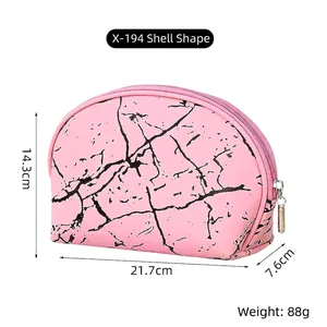 Pink shell-shaped PU makeup bag with marble pattern, 21.7x14.3x7.6cm dimensions and weight info
