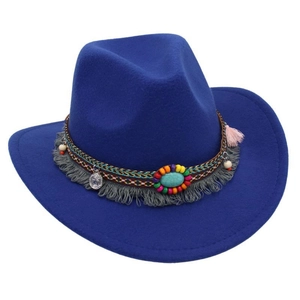 Detail of dark blue wool fedora with bohemian fringe and turquoise stone ornament