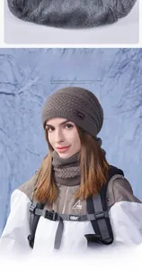 Macro view of thick thermal faux fur lining and knit texture of winter hat set