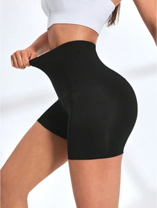 High-waist sauna yoga shorts in black stretch fabric for tummy control and body shaping