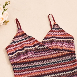 Close-up of bohemian knit camisole with colorful wavy patterns and crochet texture