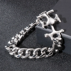 Close-up of silver punk anchor link chain bracelet resting on a black jewelry gift box