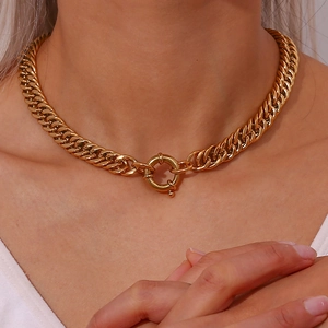 Detailed view of 18K gold-plated chunky stainless steel chain necklace with OT toggle clasp