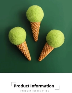 Detail of wool felt ice cream tree ornaments with green pompoms and brown cones