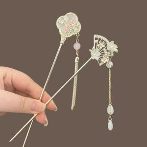 Elegant gold Chinese hair pin with pink flowers and hanging tassels for Hanfu hairstyle